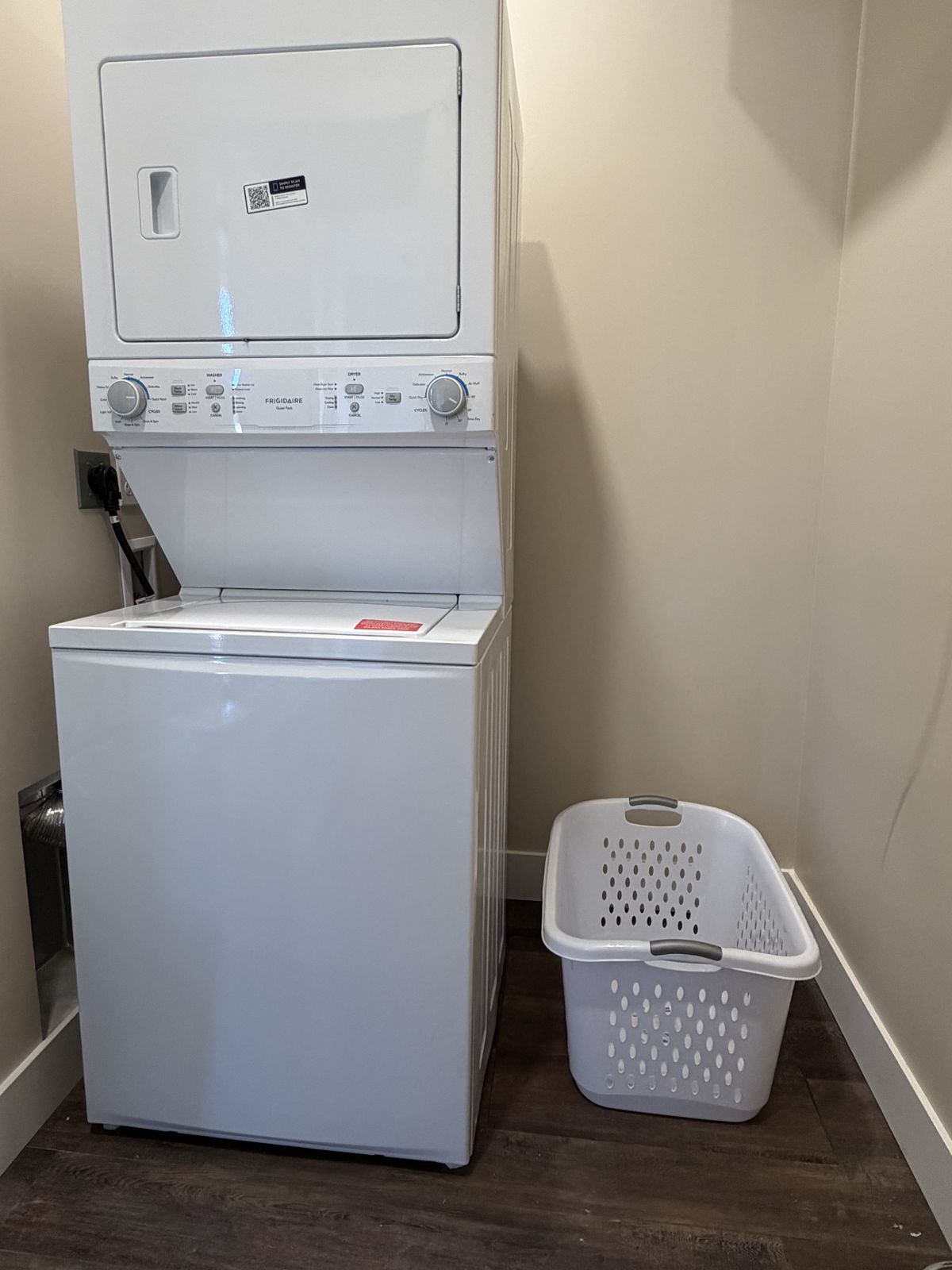 Shared laundry room with washer and dryer